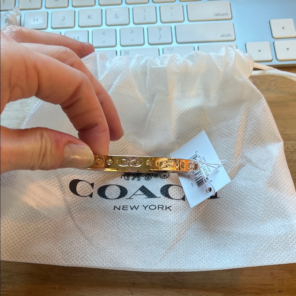 Coach Gold Tone Bangle with Signature Accents